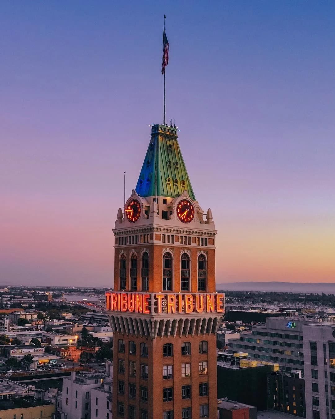 The Tribune Tower rising over downtown Oakland