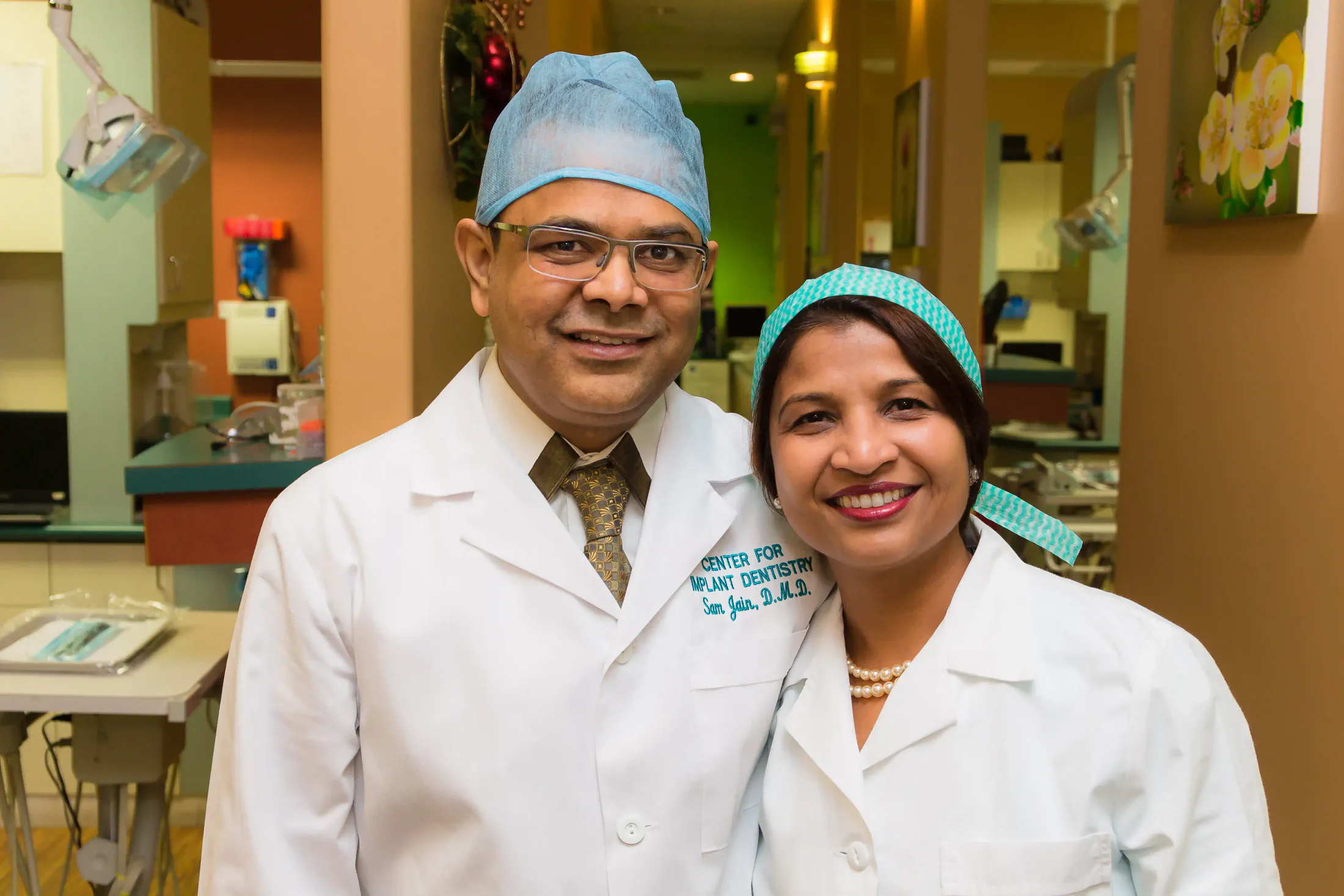 Dr. Sam Jain and Dr. Arpana Gupta together at the practice