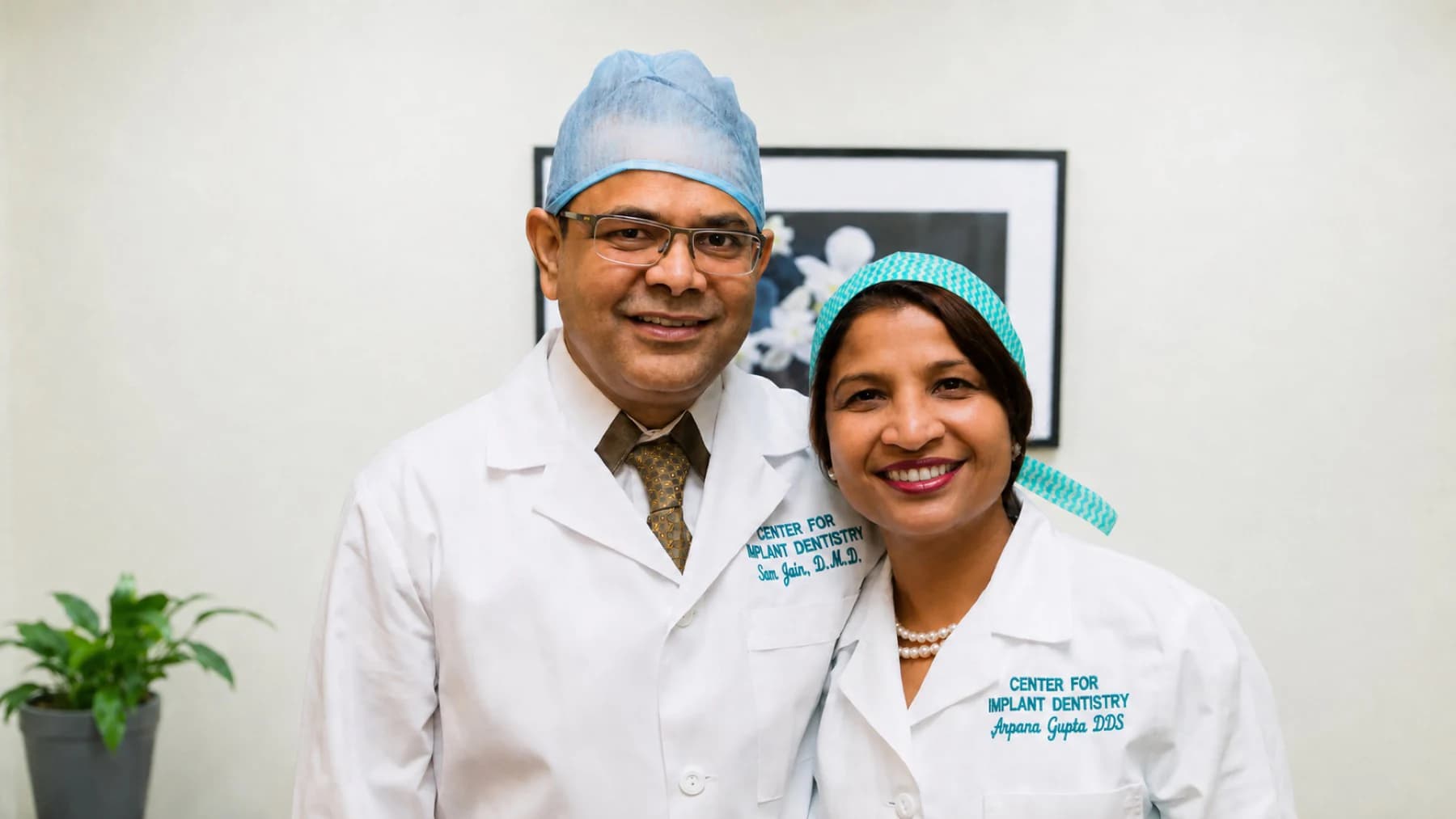 The practice's two owner surgeons in white coats