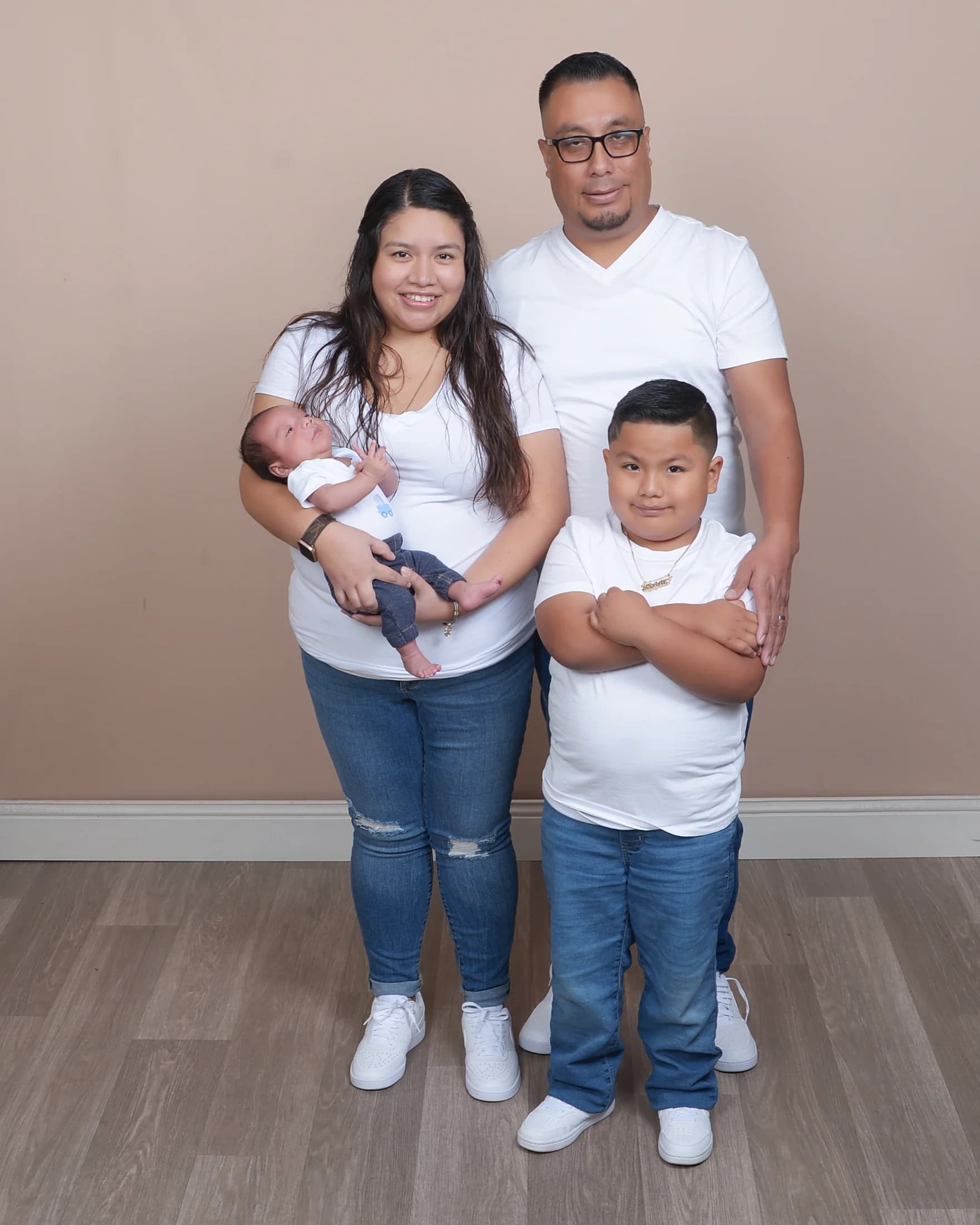 Iris Minchaca with her family in a studio portrait