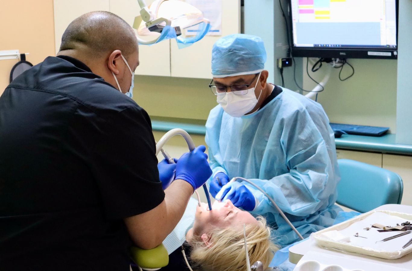 Skilled specialists at Center For Implant Dentistry in Santa Clara, CA, precisely performing a full mouth dental implant procedure for optimal results. Full Mouth Dental Implants near me.