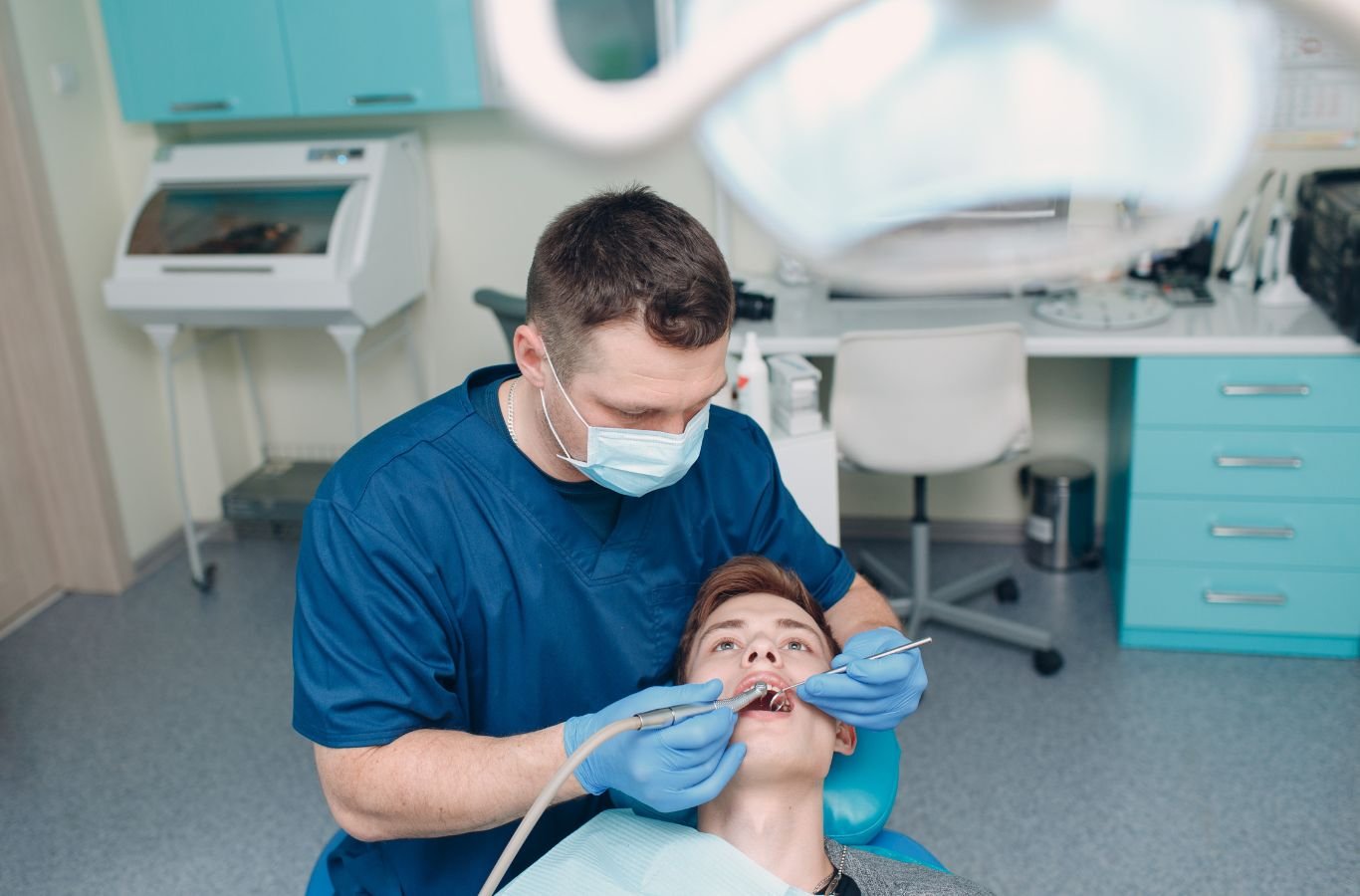 Dental Implant Complications in San Jose, CA by Center For Implant Dentistry A Center For Implant Dentistry employee managing dental implant complications in San Jose, CA with expert tools and techniques to ensure optimal outcomes.
