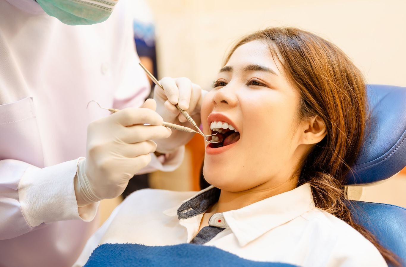 A Center For Implant Dentistry expert in Watsonville, CA evaluating a patient’s dental implant issue with precision and advanced tools.